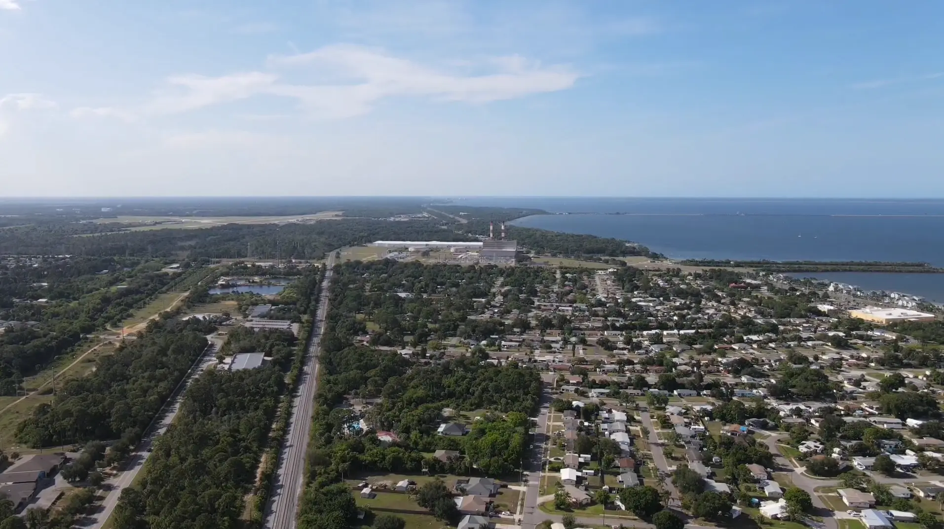 Port St. John features dense neighborhoods flanked by forested corridors and coastal access, photographed by Space Coast Dumpster Rental